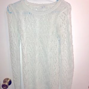 Light blue sweater with holes and sparkles